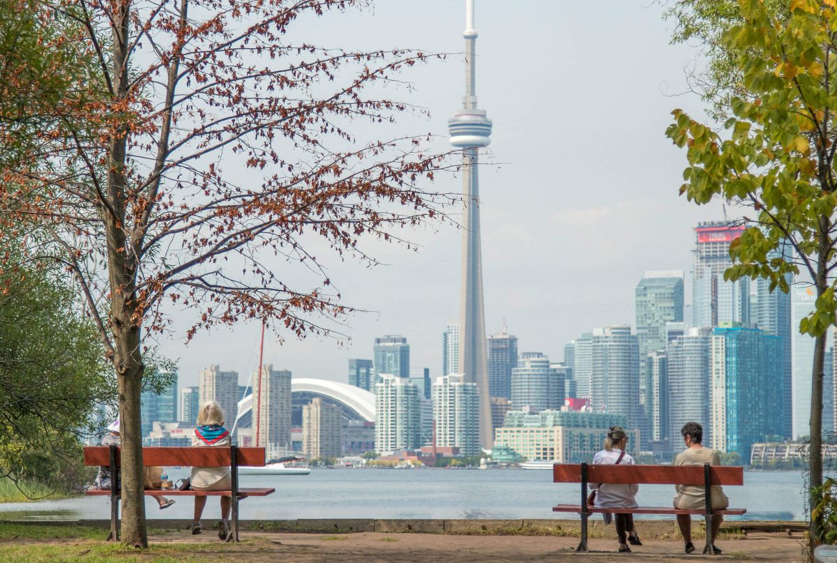 Two park benches overlooking CN Tower