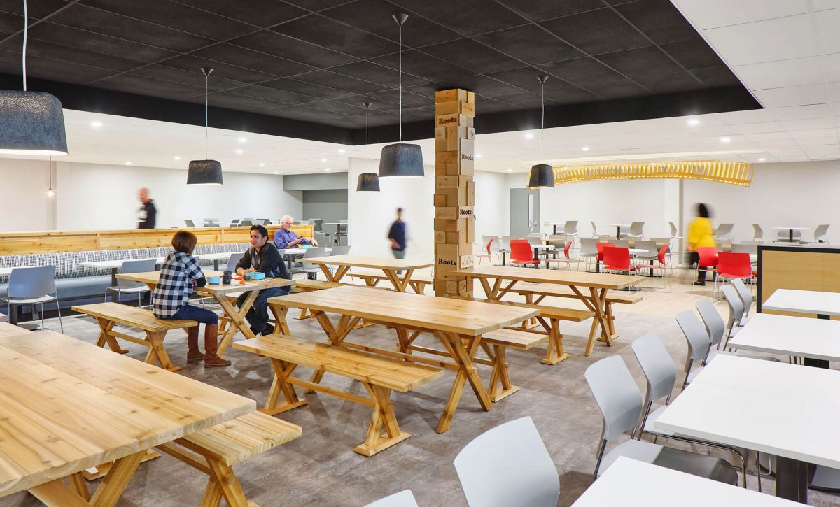 Roots Open Collab Area with Wood Tables and Benches