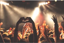 people-at-concert-heart-with-hands