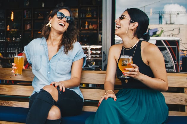 Two Women Drinking Beer